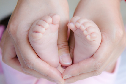 baby feet and mommy's hands 2